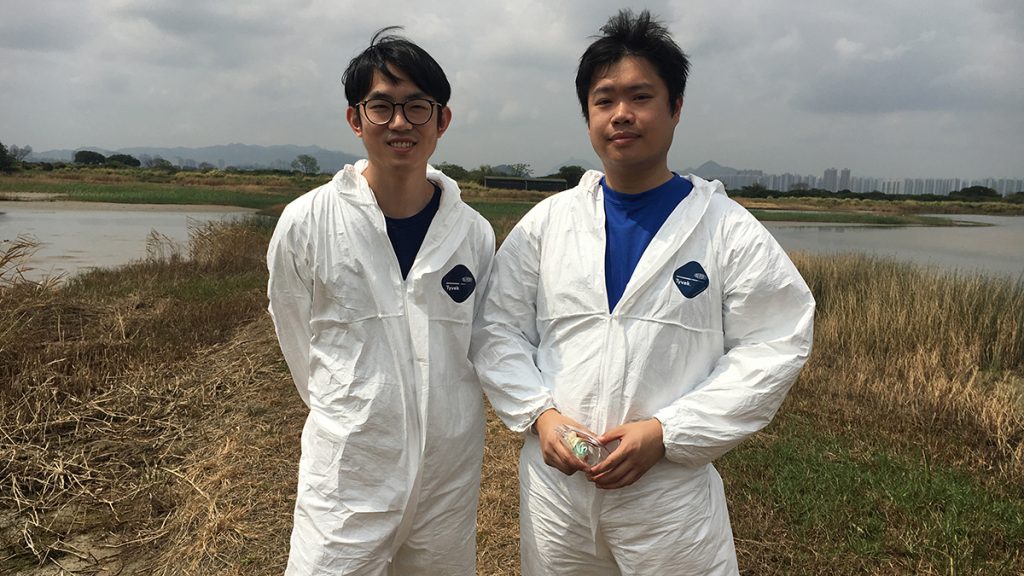 Researcher Don Wu and graduate student Sam Chan prepare to do surveillance at Mai Po Marsh.